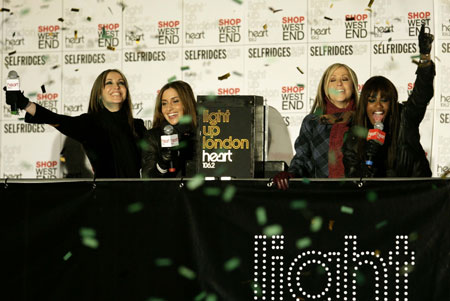 British pop group All Saints cheer as they turn on the Oxford Street Christmas Lights in central London November 9, 2006.