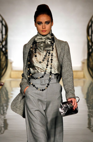 A model presents a creation by French designer Pascal Millet for Carven as part of his Autumn/Winter 2007-2008 Haute Couture fashion show in Paris, July 4, 2007.