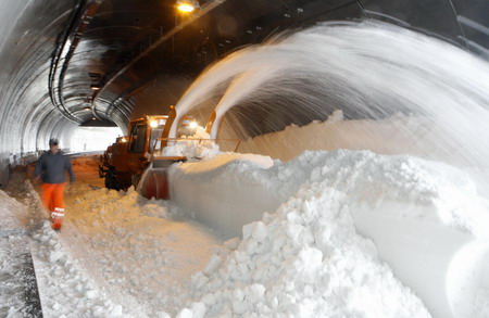 Tunnel comes out of snow stack